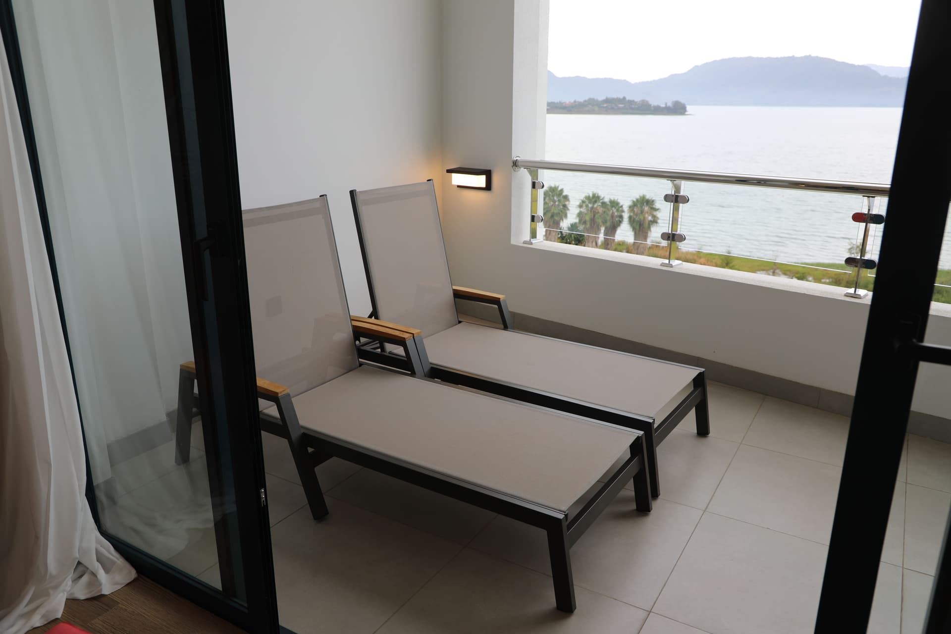 Balcony lounge along the lake façade